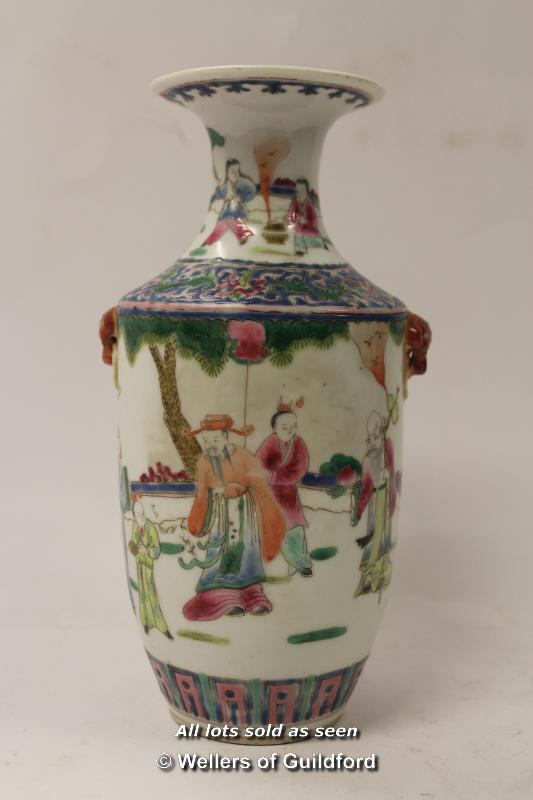 *A 19th Century porcelain vase depicting figures in a garden, 22cm.