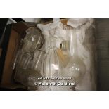 A small quantity of glassware to include oil lamp chimneys, and decanters (9)