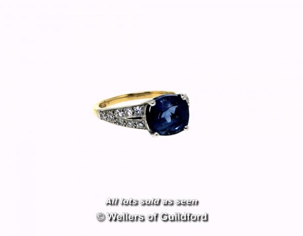 Sapphire and diamond ring, central cushion cut blue sapphire weighing an estimated 3.00cts, four - Image 3 of 4