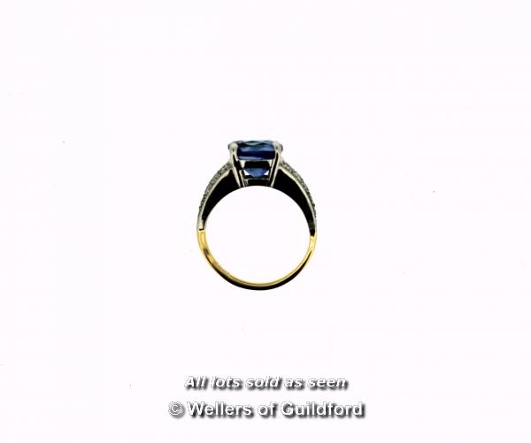Sapphire and diamond ring, central cushion cut blue sapphire weighing an estimated 3.00cts, four - Image 4 of 4