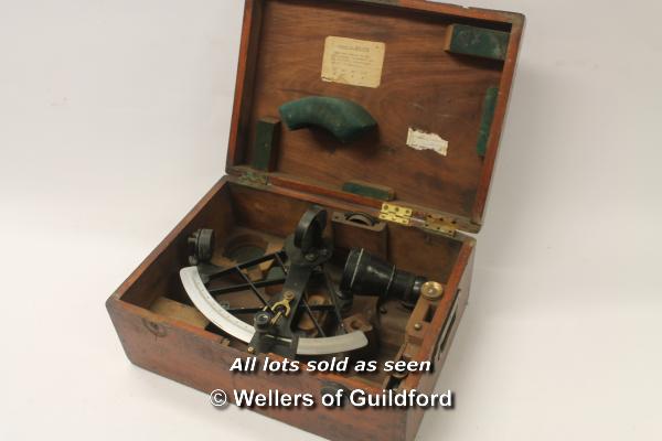 *A cased laqured iron sextant with brass dials no. H0.159 (Lot subject to VAT)