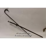 A malacca walking cane with Chinese white metal mount, 89cm; a faux bamboo walking stick. (2)