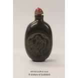 A Chinese horn snuff bottle.