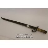 19th Century French bayonet and scabbard with ribbed brass handle, serial number P54048, length of