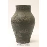 A Chinese bronze baluster vase decorated in relief with dragons, 28.5cm.