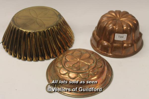 Three copper plated jelly moulds, the largest 25cm diameter.