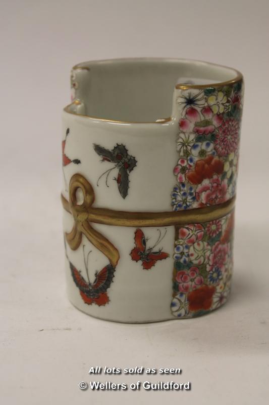 A pretty Chinese brush pot of shaped circular form, decorated with butterflies and flowers, 8cm.