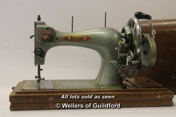 *A vintage B.S.M. sewing machine type 7000 with manual and case (Lot subject to VAT)