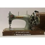 *A vintage B.S.M. sewing machine type 7000 with manual and case (Lot subject to VAT)