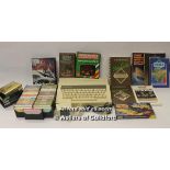 A vintage Acorn Electron computer together with assorted games and accessories