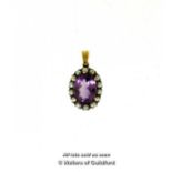 *Vintage amethyst and seed pearl pendant, oval cut amethyst with a surround of seed pearls,