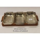 *A set of three silver serving dishes in wooden rack, the dishes stamped 'International, Sterling'