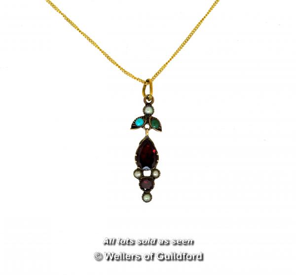 *Antique flower pendant set with garnets, turquoise and seed pearls, with a yellow metal backing