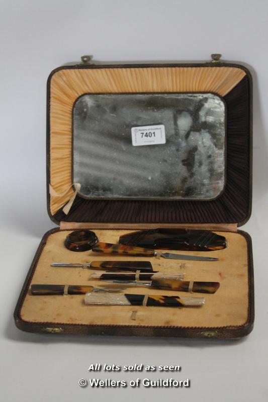 *Faux tortoiseshell manicure set, 1920's, cased.(Lot subject to VAT)