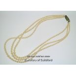 *Vintage three row pearl necklace with white metal clasp stamped 9ct, set with a small rose cut