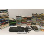 Retro Gaming: a Sinclair ZX Spectrum console, instruction manual and software with a huge collection