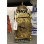 *A French brass lantern clock, brass dial with Roman numerals and two train movement, the back plate