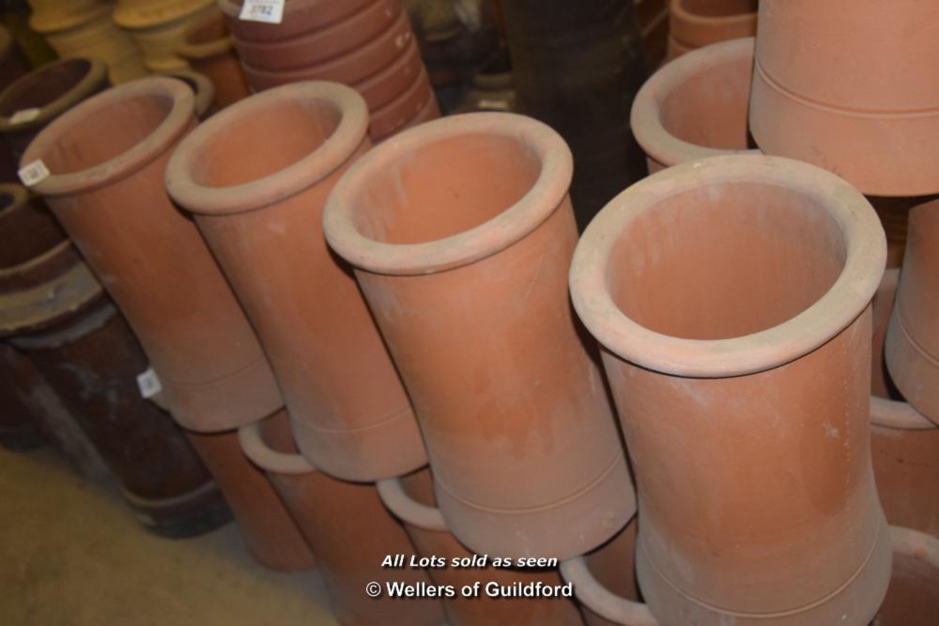 *FOUR MATCHING CYLINDRICAL CHIMNEY POTS, EACH 500MM HIGH