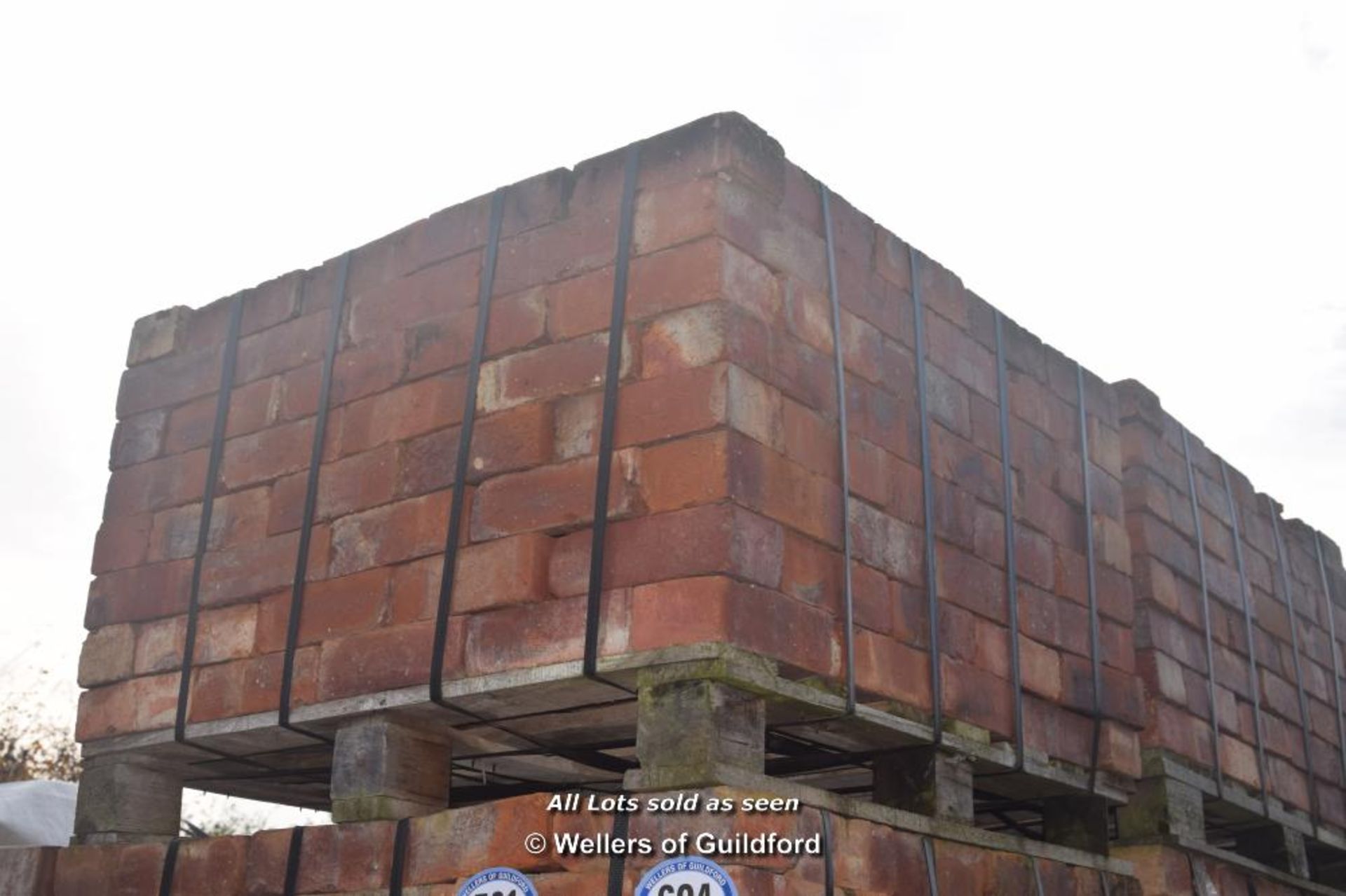 *PALLET OF APPROX THREE HUNDRED RED BRICKS APPROX SIZE 8 1/2" X 2 3/4"