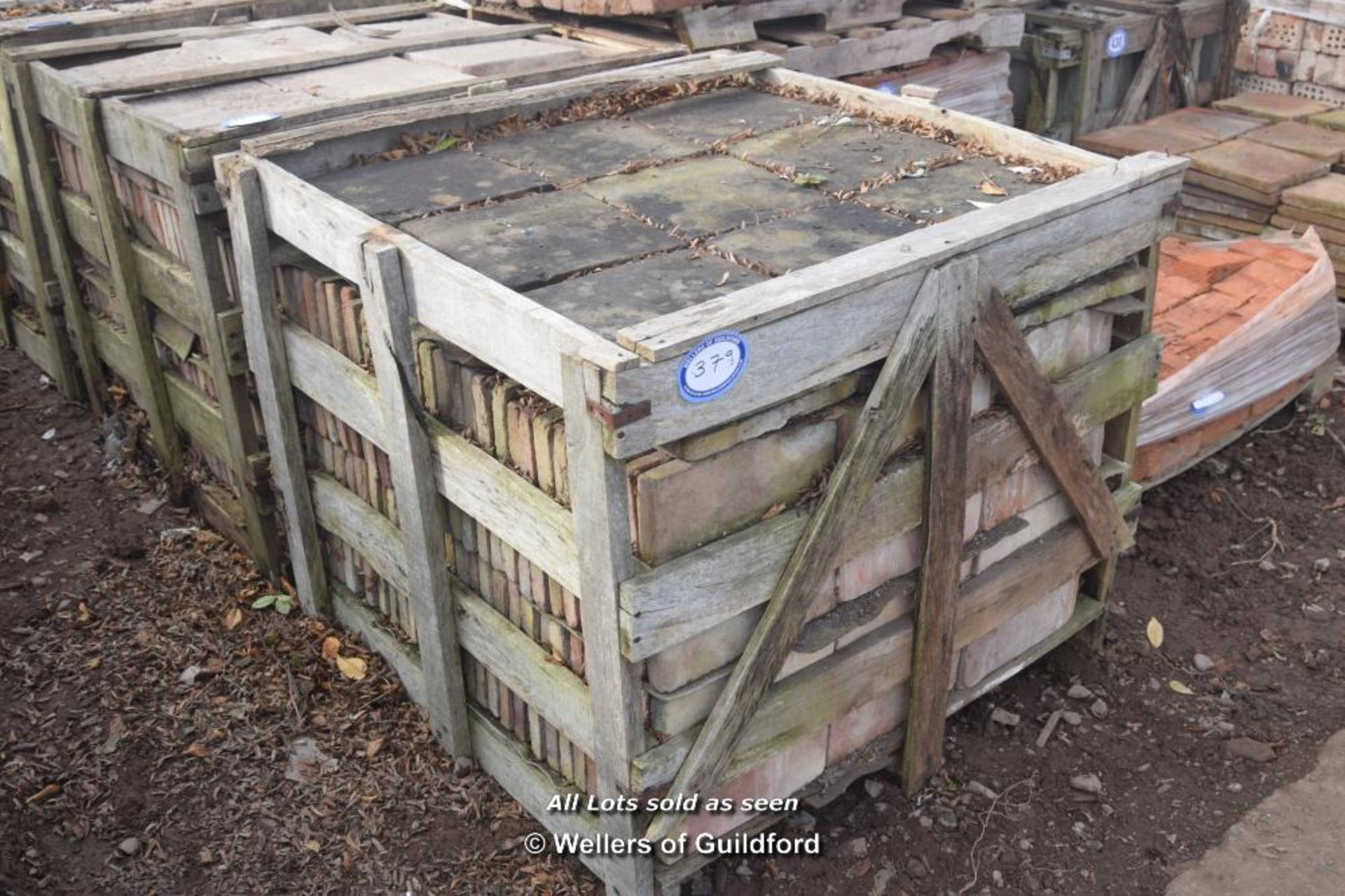 *CRATE CONTAINING APPROX TWO HUNDRED RED QUARRY TILES, EACH 300MM X 300MM