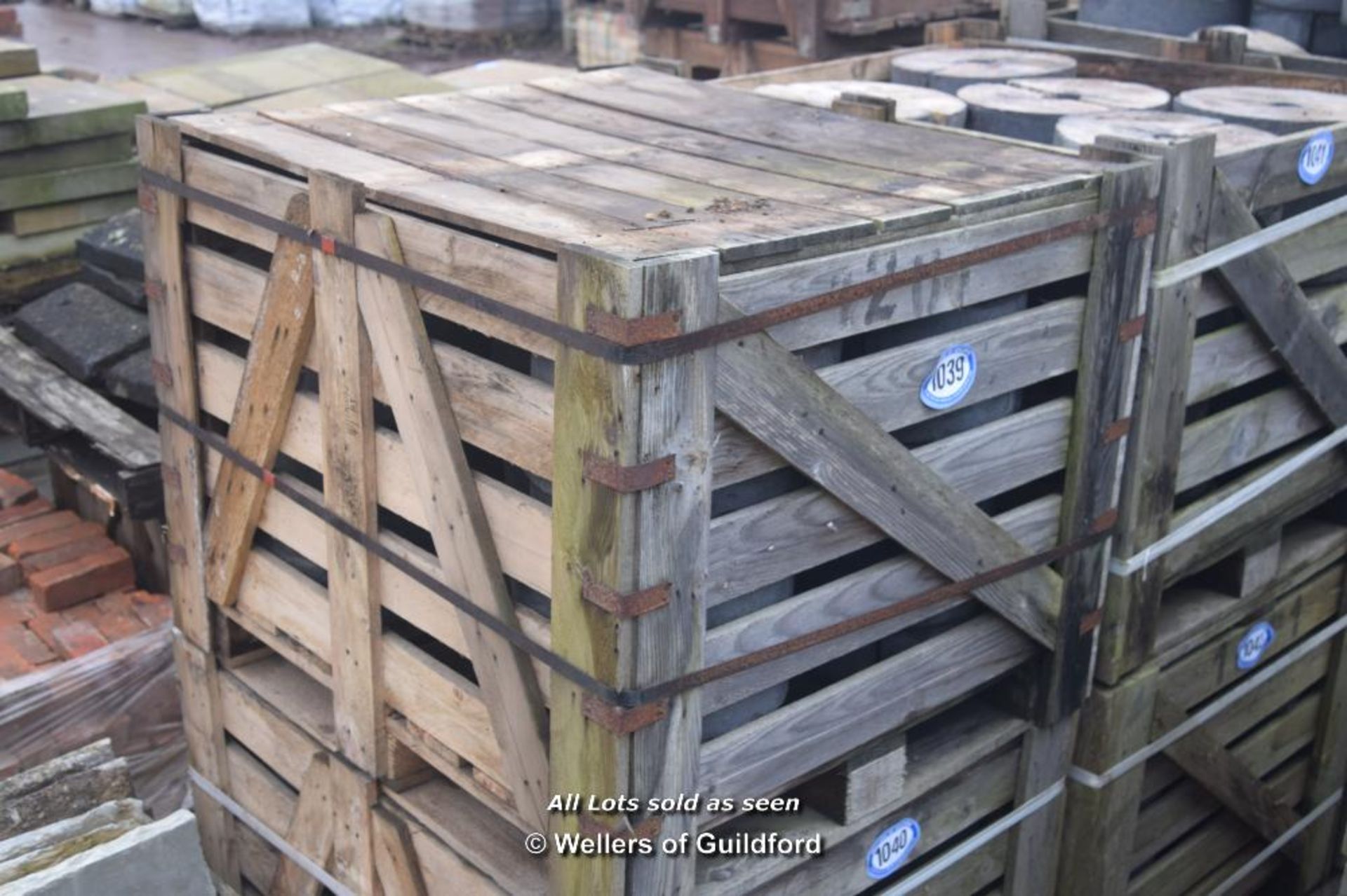 *CRATE CONTAINING APPROX SEVENTY BLUE HALF ROUND COPING BRICKS