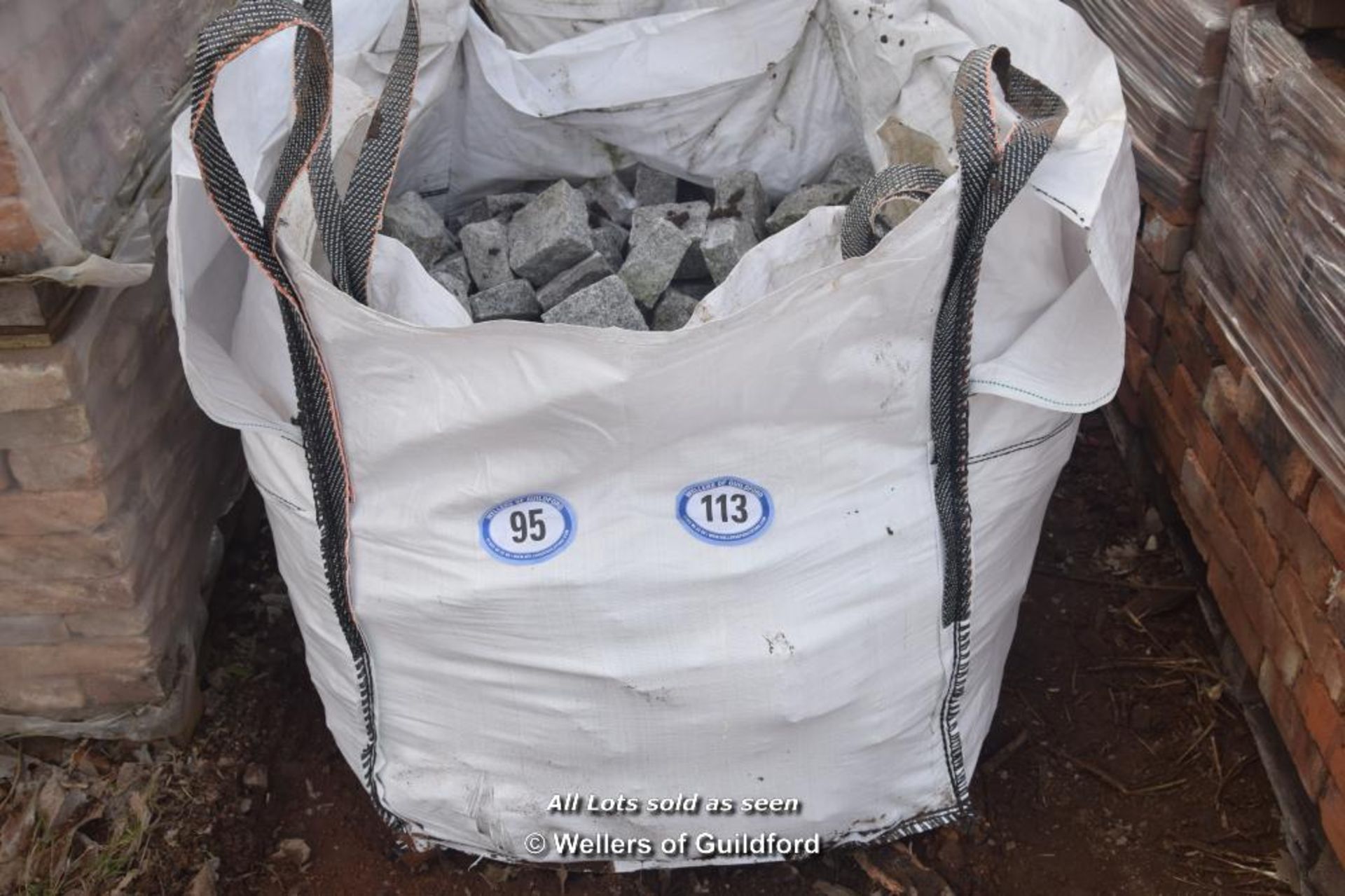 *BAG CONTAINING GREY GRANITE SETTS APPROX SIZE 100 x 100 x 50MM