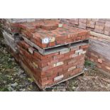 *ONE AND A HALF PALLETS OF APPROX FIVE HUNDRED RED BRICKS, 9" X 2 3/4"