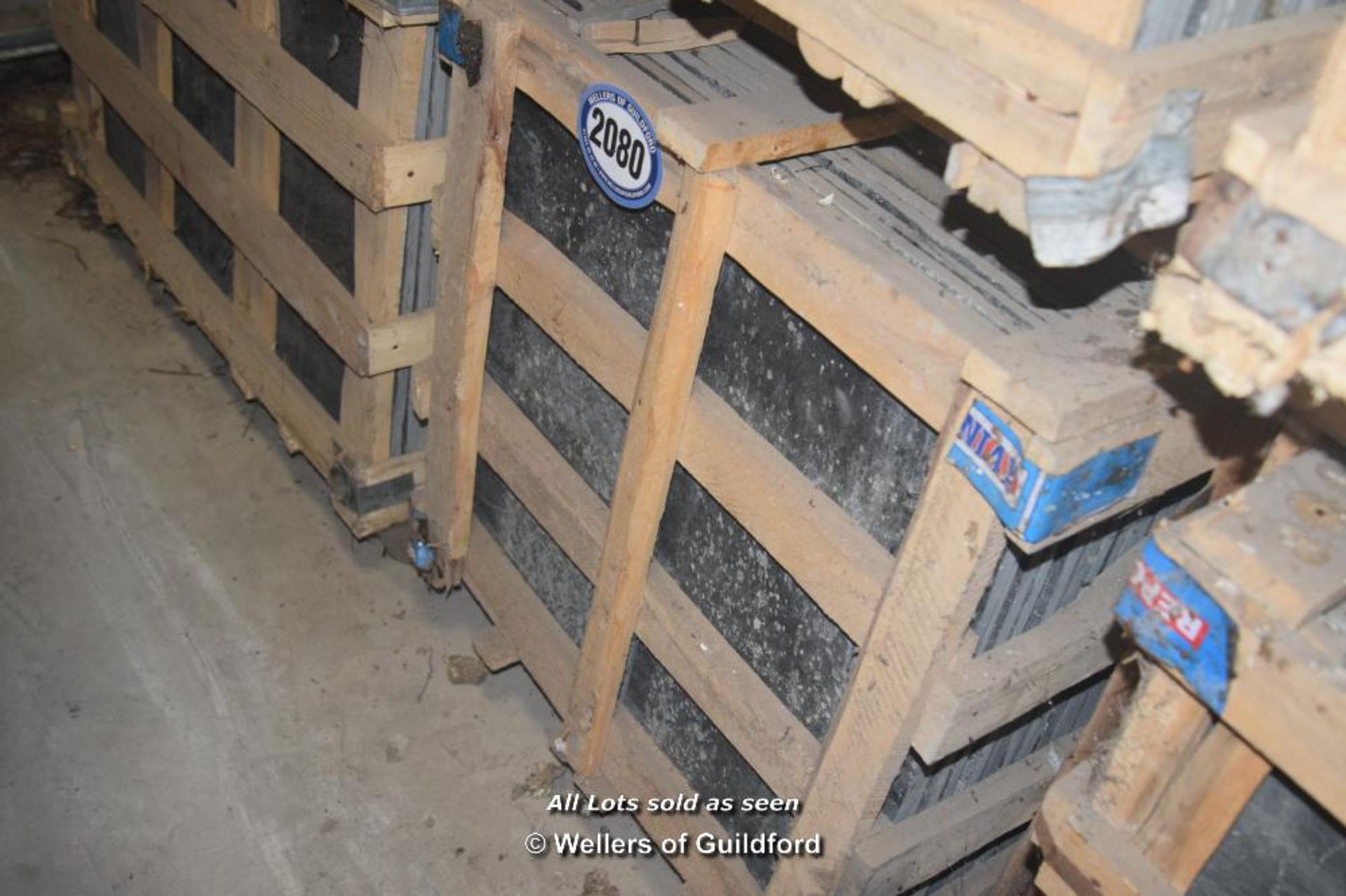 *CRATE CONTAINING APPROX TWENTY ONE SQUARE METERS OF BLACK SLATE FLOOR TILES 600MM X 300MM X 10MM