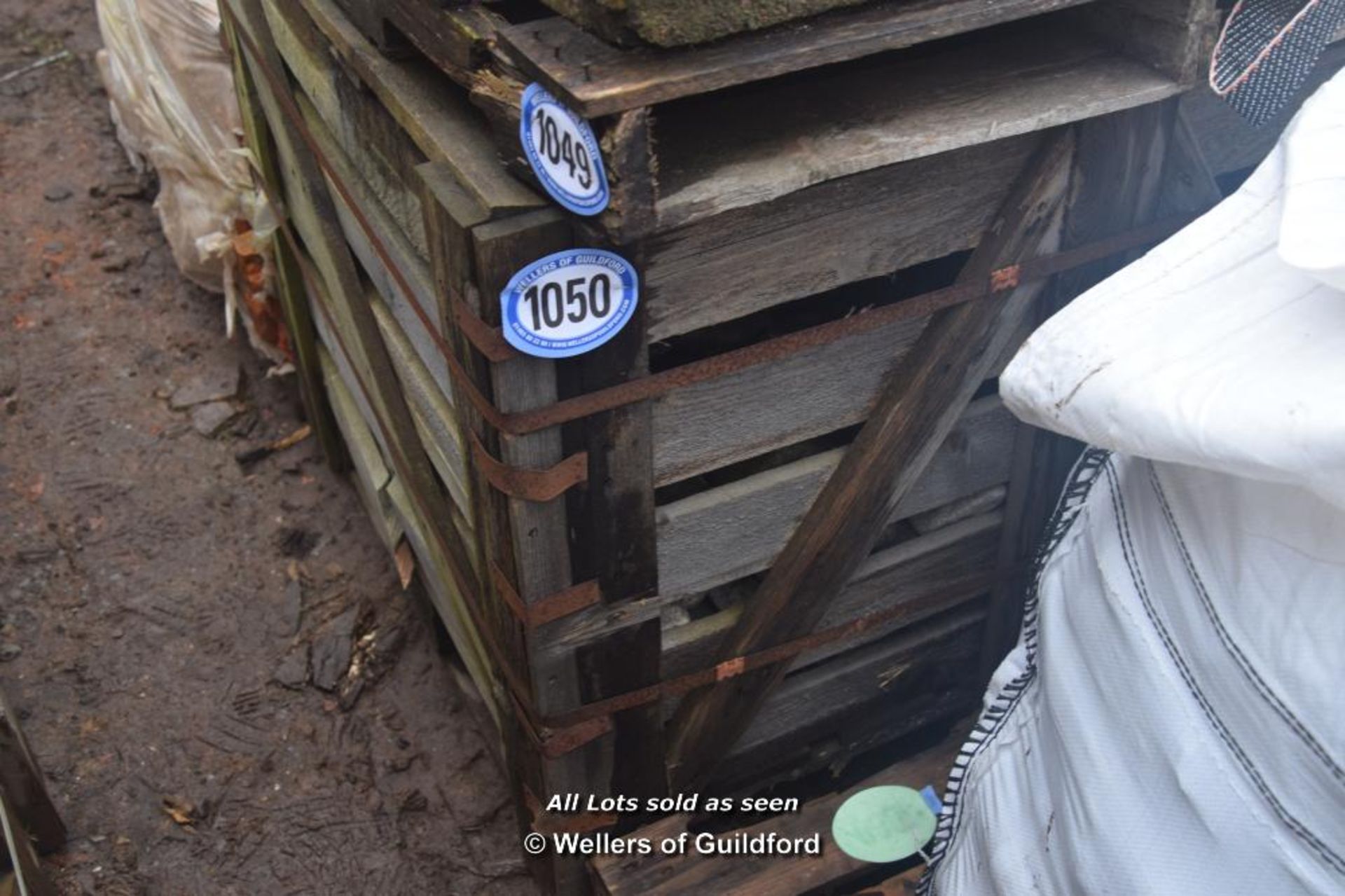 *CRATE CONTAINING WHITE GRANITE SETTS