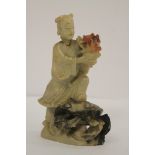 A Chinese carved hardwood soapstone figure, 14.5cm.