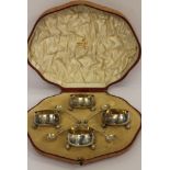 A set of four Mappin & Webb circular silver salts with matching spoons, Sheffield 1903, 213g,