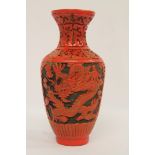 A Chinese cinnabar lacquer style baluster vase, 16.5cm.