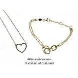 *Silver heart pendant set with white stones, and a silver bracelet set with white stones, gross