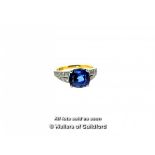 Sapphire and diamond ring, central cushion cut blue sapphire weighing an estimated 3.00cts, four