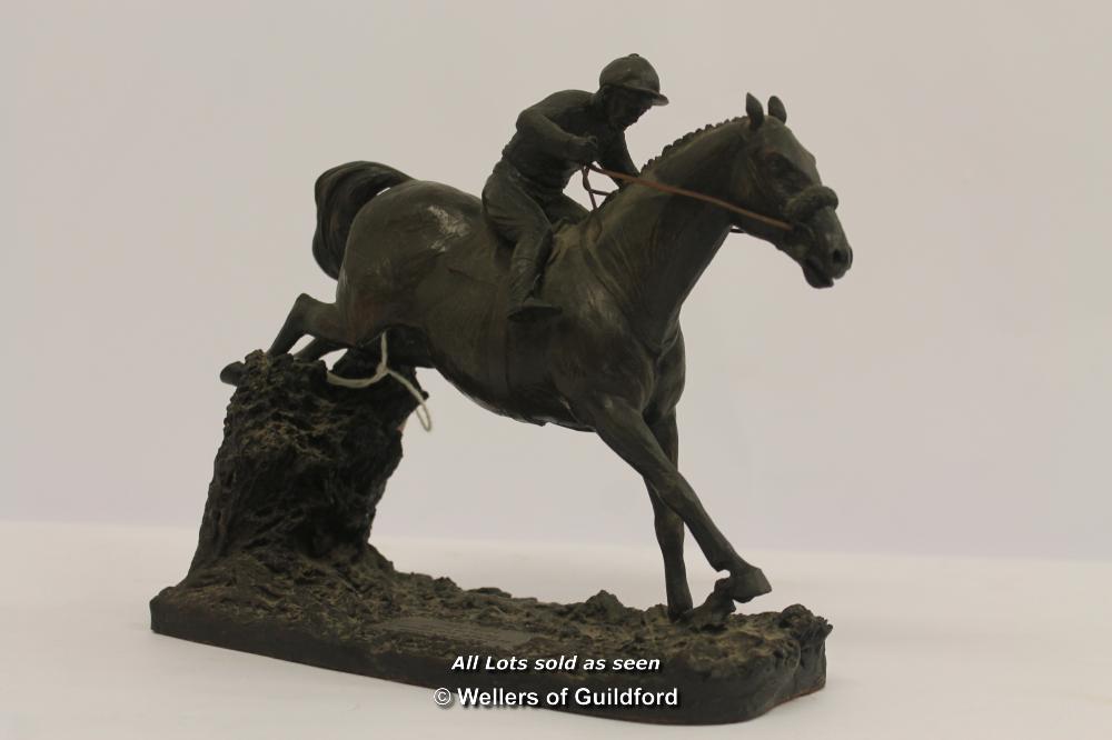 Robert Donaldson, bronze resin sculpture of Red Rum with jockey up, cast by Heredities Ltd, 21cm. ¦