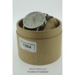 Gentlemen's Kahuna wristwatch, circular silvered dial with baton hour markers, on a white brown