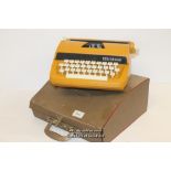 *Vintage cased Petite International de lux typewriter (Lot subject to VAT)