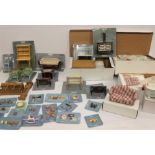 A quantity of dolls house furniture, much of it by Del Prado and still in original packaging.