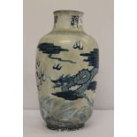 A large Chinese blue and white vase decorated with dragon chasing flaming pearl, 33cm.