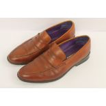 Pair of Billy Ruffian gents brown leather slip-on shoes, size 9.