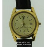 Gentlemen's TCB Elvis Presley novelty wristwatch, circular gold coloured dial with baton hour