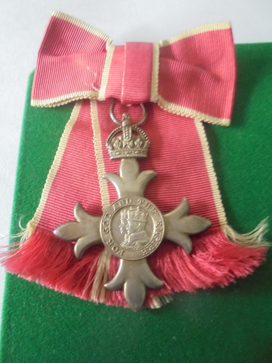 Member of the Order of the British Empire, King and Queen obverse, civilian, on ladies bow ribbon.