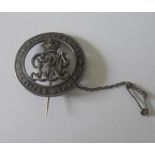 Silver War Badge. No.B228764 awarded to Private Richard A. Burton, Royal Fusiliers, who was