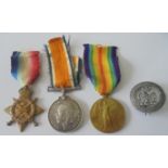 A Mons Trio and Silver War Badge to Private A. Norris, 1st Battalion, Bedfordshire Regiment. 1914