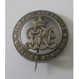 Silver War Badge. No. B97241 awarded to Driver Robert Townsley, Royal Army Service Corps, discharged