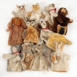 12 Handspielpuppen STEIFF.Um 1960. 8x gemarkt mit Knopf oder Brustschild. L 23-26 cm. Verschiedene