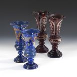 4 böhmische Vasen.2. Hälfte 19. Jahrhundert. 2x kobaltblaues Glas mit vegetabiler Emailmalerei,2x