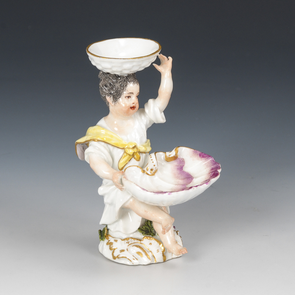 Saliere, MEISSEN.Schwertermarke am Sockel, um 1745. Farb- und goldstaffiert. H 10 cm. Sitzendes