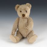 Kleiner STEIFF-Teddy.Knopf im Ohr (mit langgezogenem 'f'). L 21 cm. Blonder Bär mit Glasaugen, braun