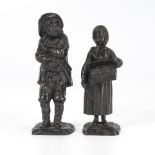 2 volkstümliche Figuren aus Eisenguss.Gusseisen geschwärzt. H 17 bzw. 15,5 cm. Bauer mit